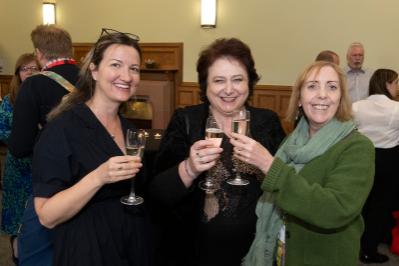 three ladies smiling